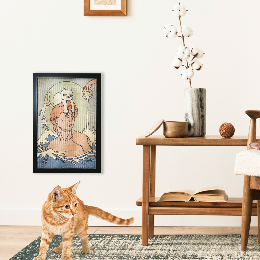 David's Paw Cat Scratcher Medium on the wall with an orange cat in front of it
