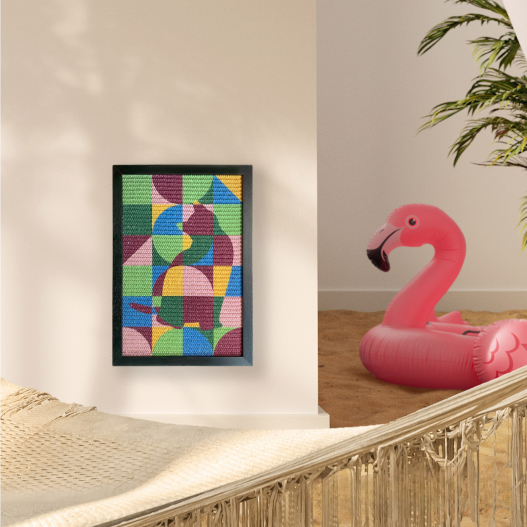 Geomeowtric Cat Scratcher Medium, with a flamingo swimming ring